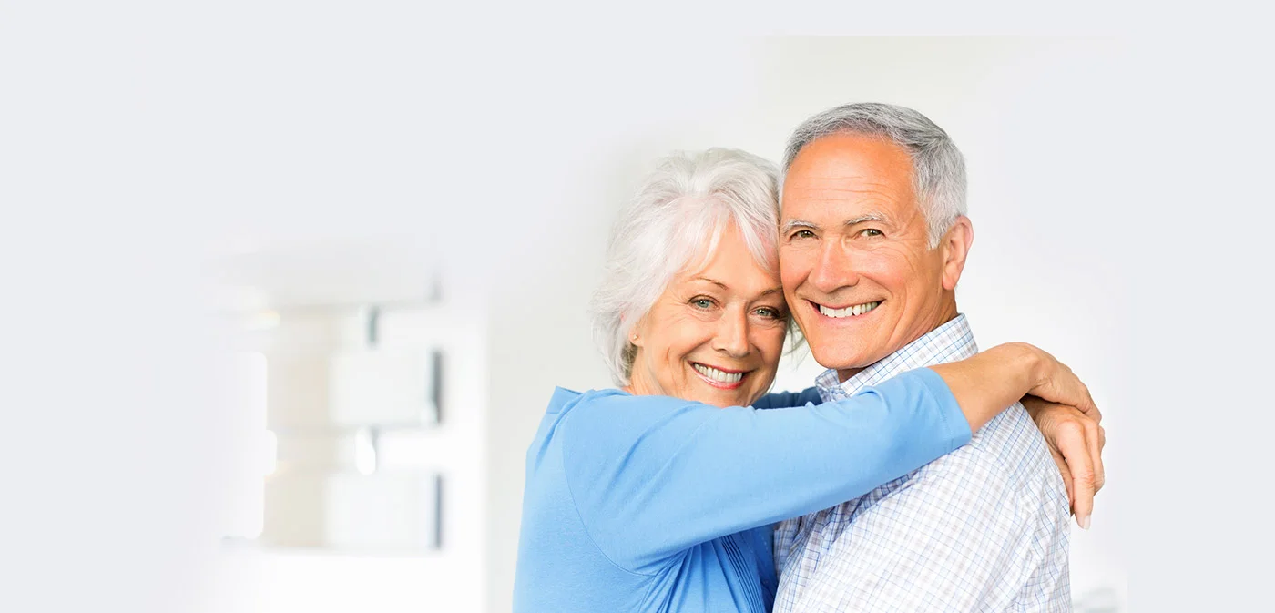 Happy senior couple with confident smiles