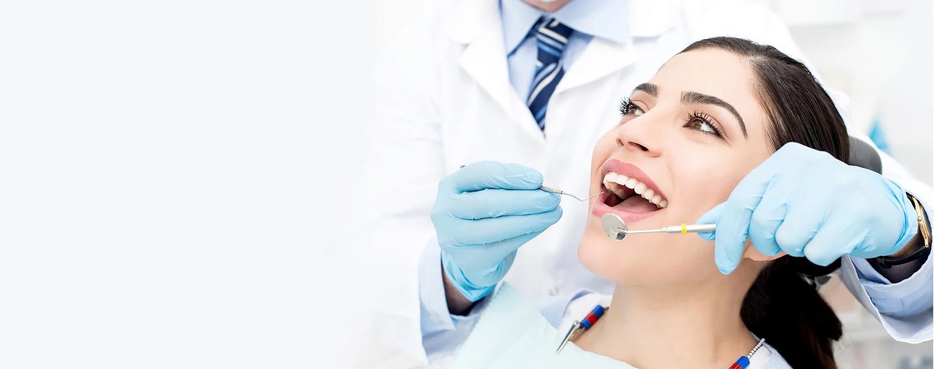 Relaxed patient smiling in the dental chair